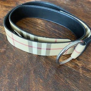 Burberry clasp adjustable belt. Original pattern. Coated fabric over leather.